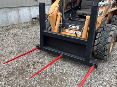 Three spike bale spear for skidsteer