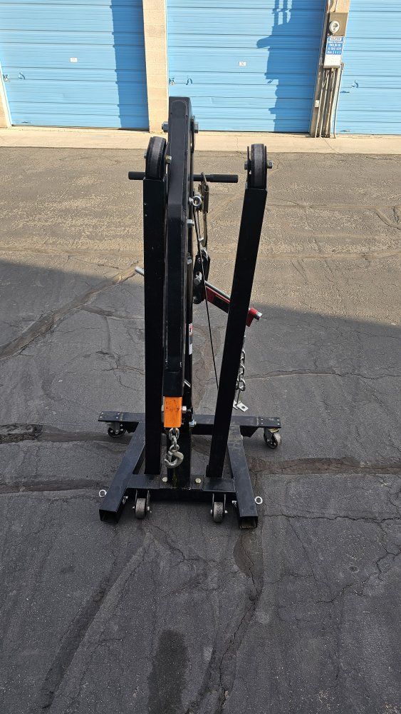 Folding Hydraulic Engine Hoist - 2 Ton Capacity Shop Crane with Engine Leveler and Chains