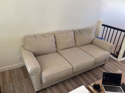 Bassett 87” Light Beige Fabric Sofa with Rolled Arms and Three Cushions
