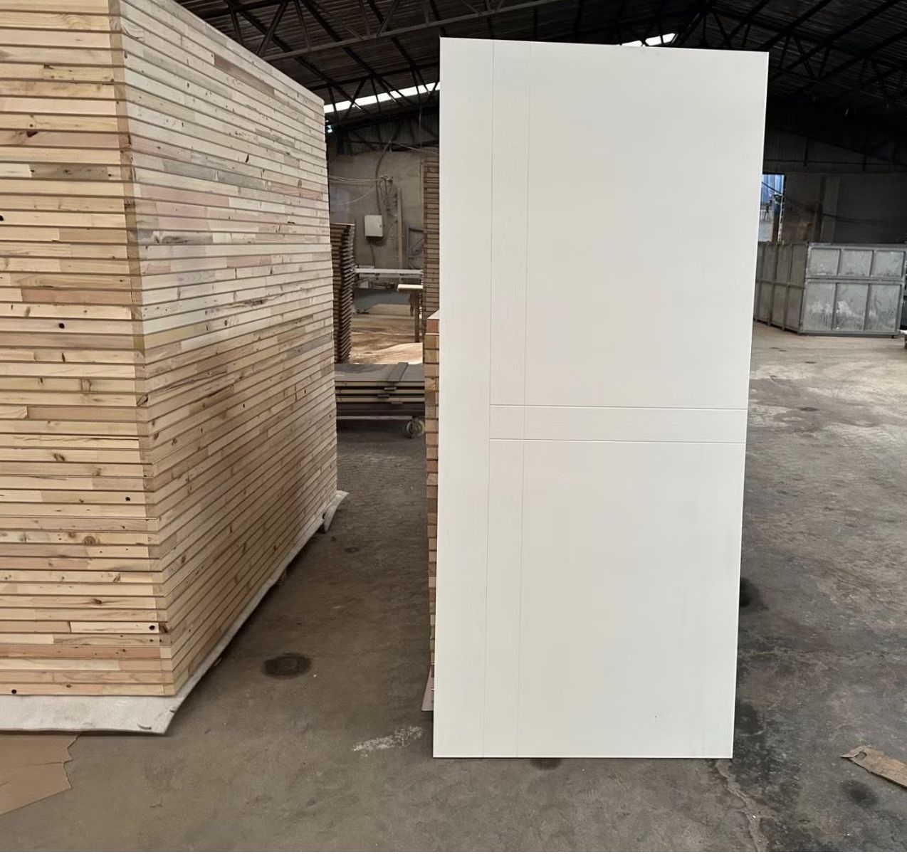 Primed Hardboard Doors - White Panelled Interior Doors on Pallet