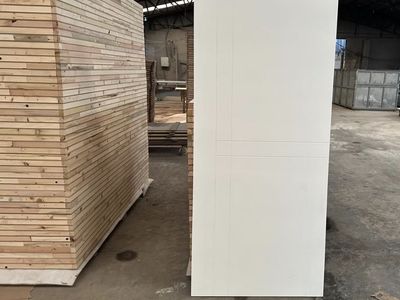 Primed Hardboard Doors - White Panelled Interior Doors on Pallet