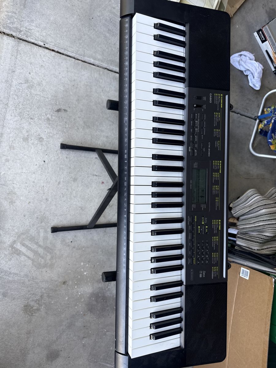 Casio CTK-2080 61-Key Portable Electronic Keyboard Piano with Stand