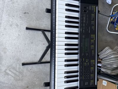 Casio CTK-2080 61-Key Portable Electronic Keyboard Piano with Stand
