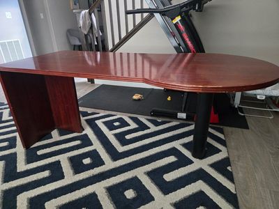 Long wood desk with rounded top
