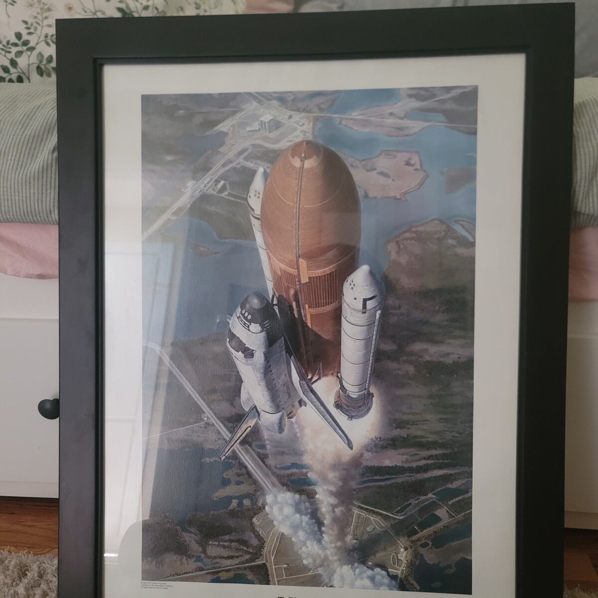 framed picture of space shuttle discovery