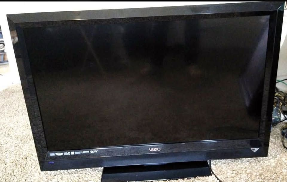 37" Visio hd television and remote control