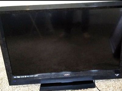 37" Visio hd television and remote control