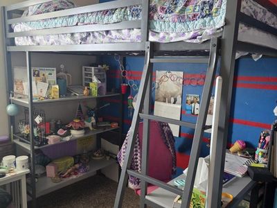 Loft bed with desk and shelves