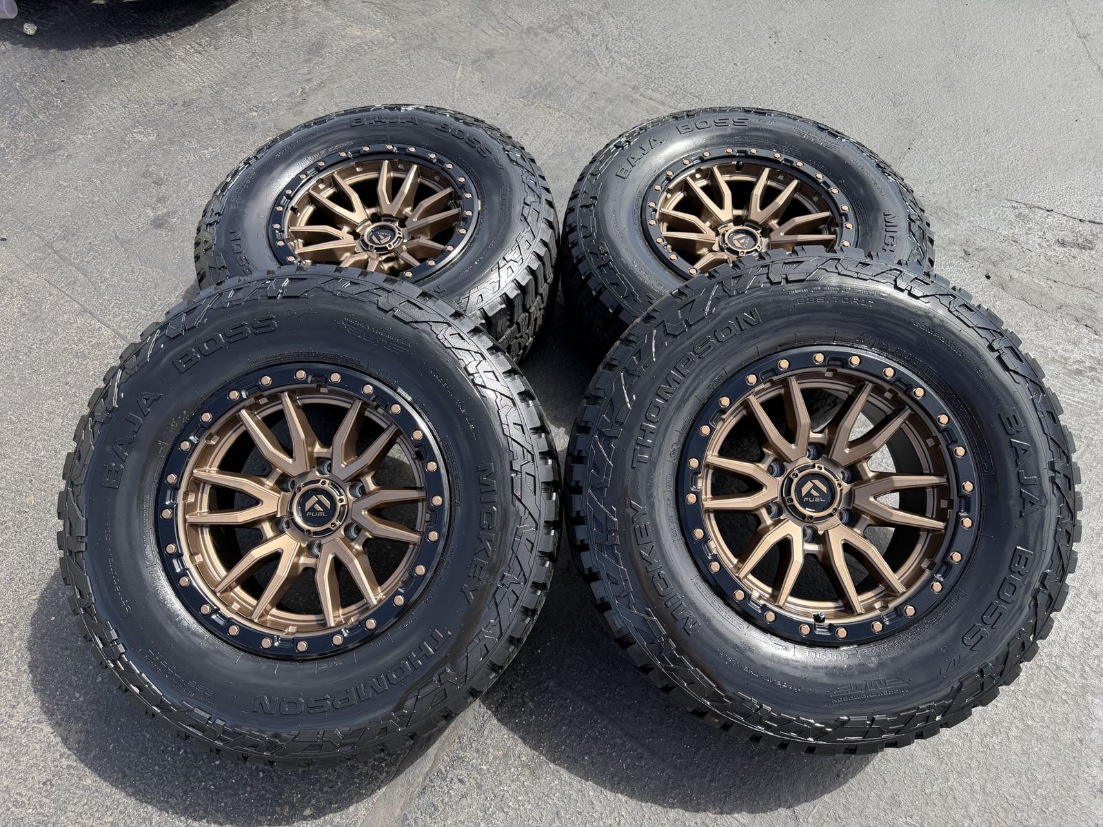 New Mickey Thompson Baja Boss AT 285/70r17 Bronze Fuel Rebel 6x5.5 Chevy Silverado 1500 Toyota Tacoma 4Runner GMC 3 Peak Snow
