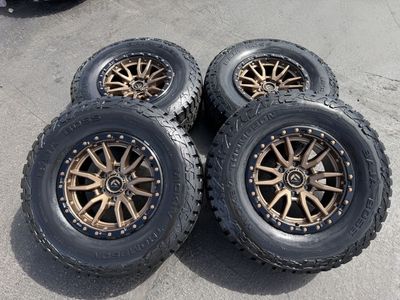 New Mickey Thompson Baja Boss AT 285/70r17 Bronze Fuel Rebel 6x5.5 Chevy Silverado 1500 Toyota Tacoma 4Runner GMC 3 Peak Snow