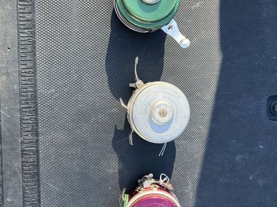 Lot of 3 Vintage Fishing Reels - Green, Silver, and Purple Automatic Fly Reels