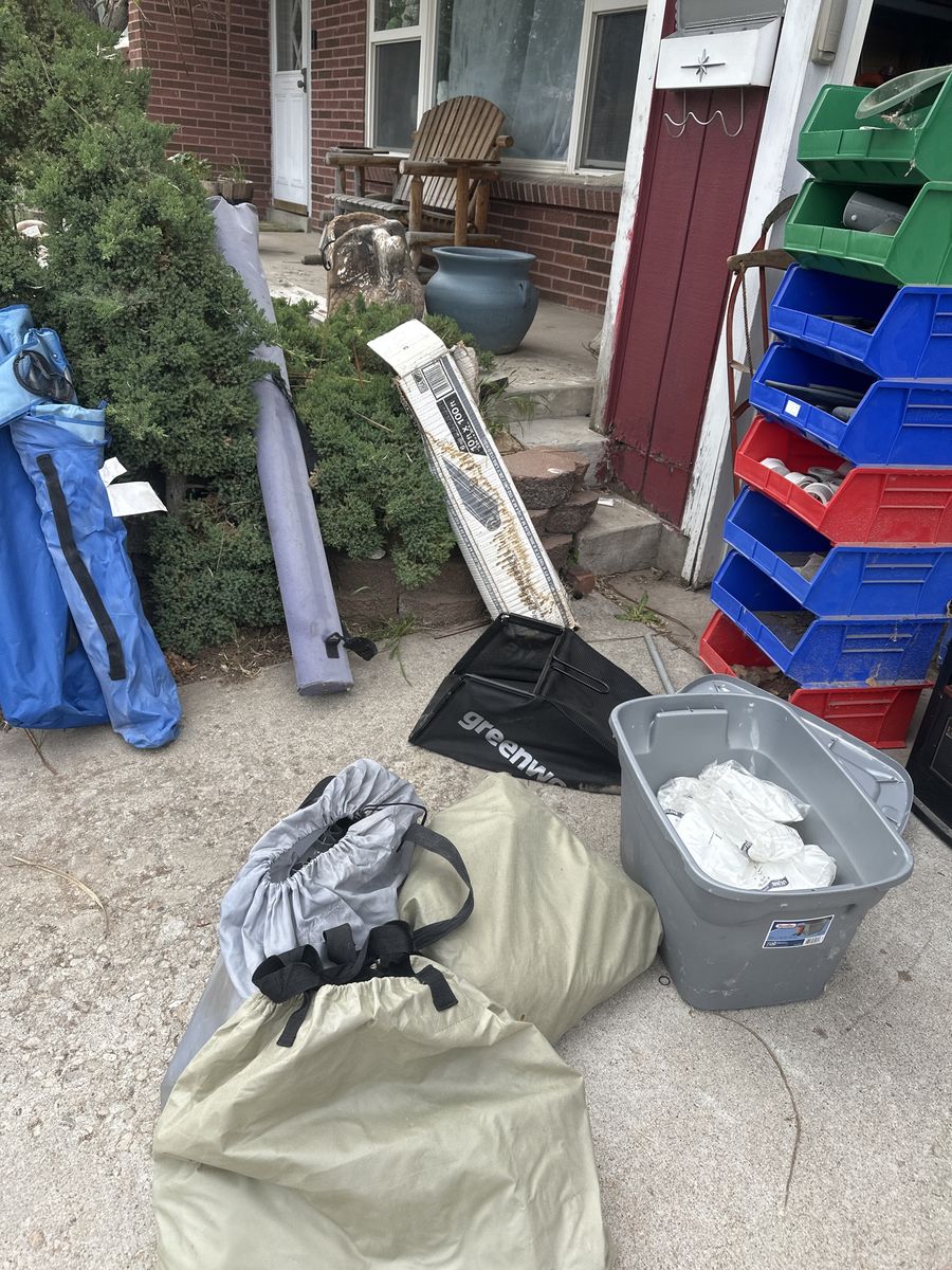 garage clean out, plastic lining, camping chairs, air mattresses, pond equipment, portable heater, fishing pole case