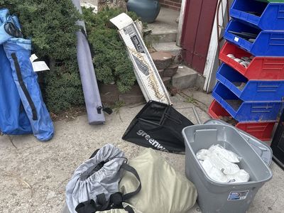 garage clean out, plastic lining, camping chairs, air mattresses, pond equipment, portable heater, fishing pole case