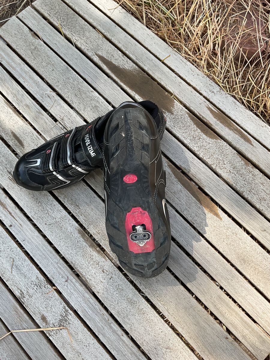 black with touches of red and white cross country bike shoes