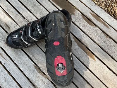 black with touches of red and white cross country bike shoes