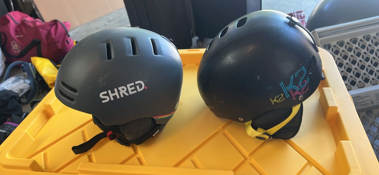 2 snowboard/ski helmets