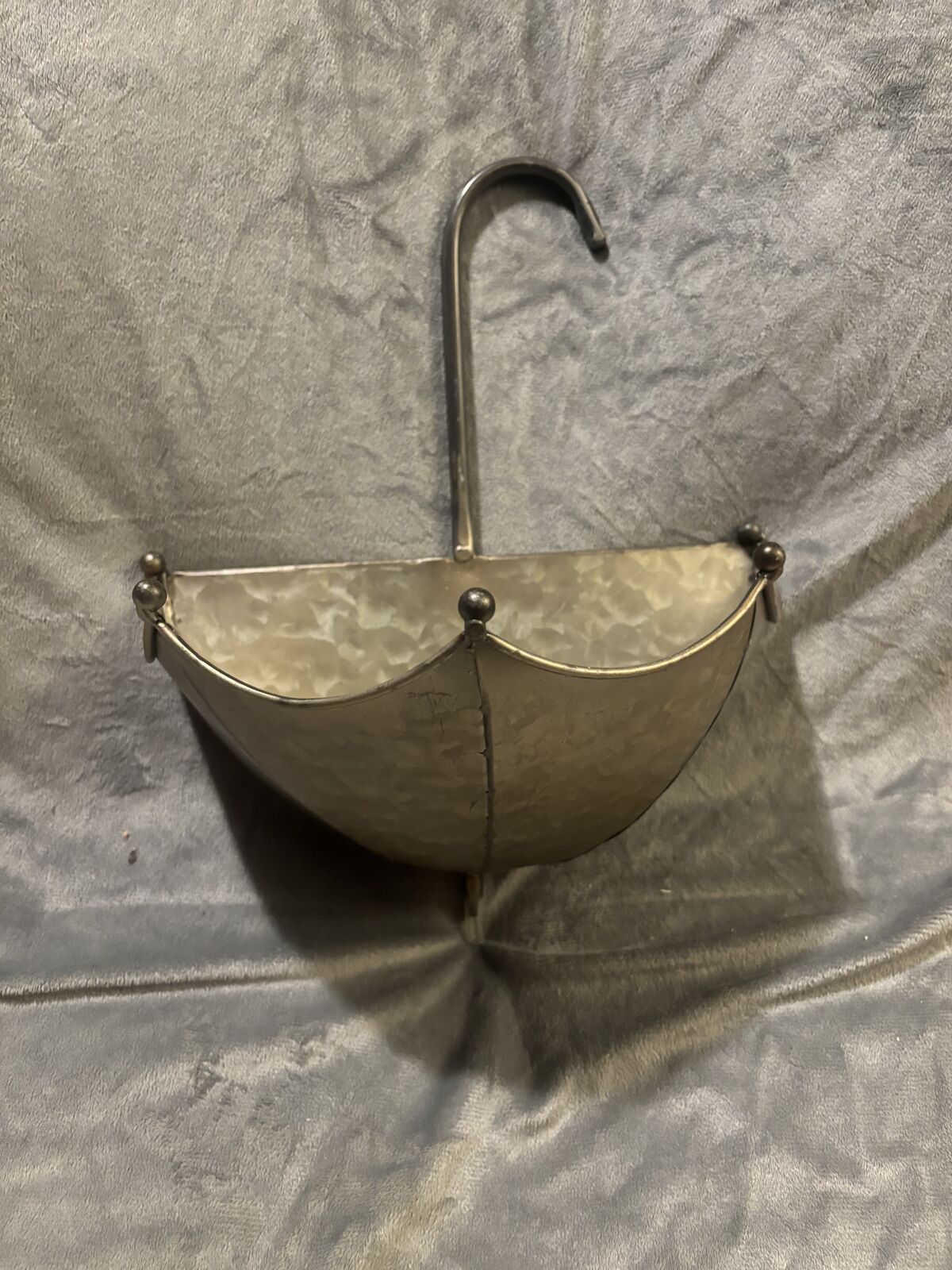 Umbrella wall hanging.