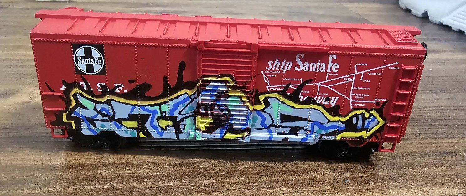 Custom graffiti model train