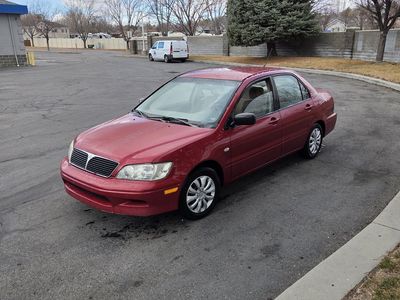 2002 mitsubishi lancer 2.0l auto fwd 260k miles NEED IT GONE TODAY
