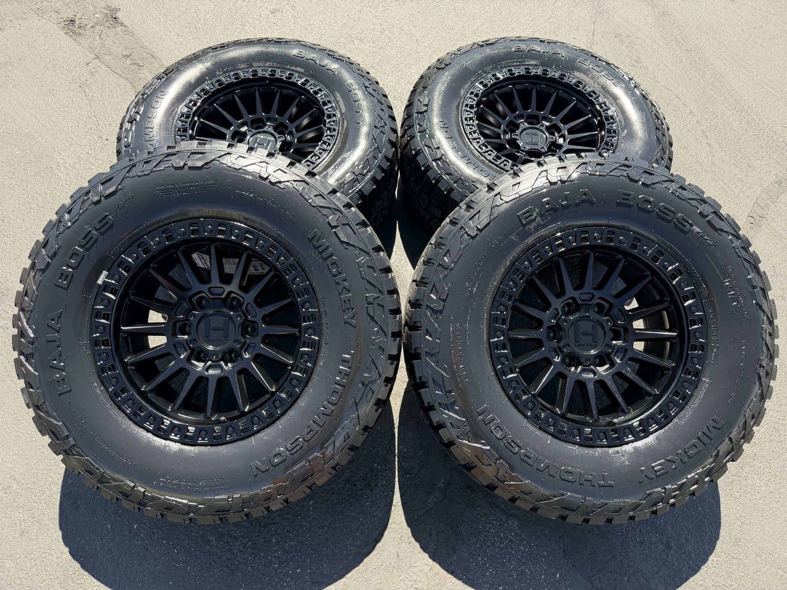 New 285/70r17 Mickey Thompson Baja Boss AT Black Hostile H137 Battle 6x5.5 Chevy Silverado 1500 Toyota Tacoma GMC Sierra 6 lug
