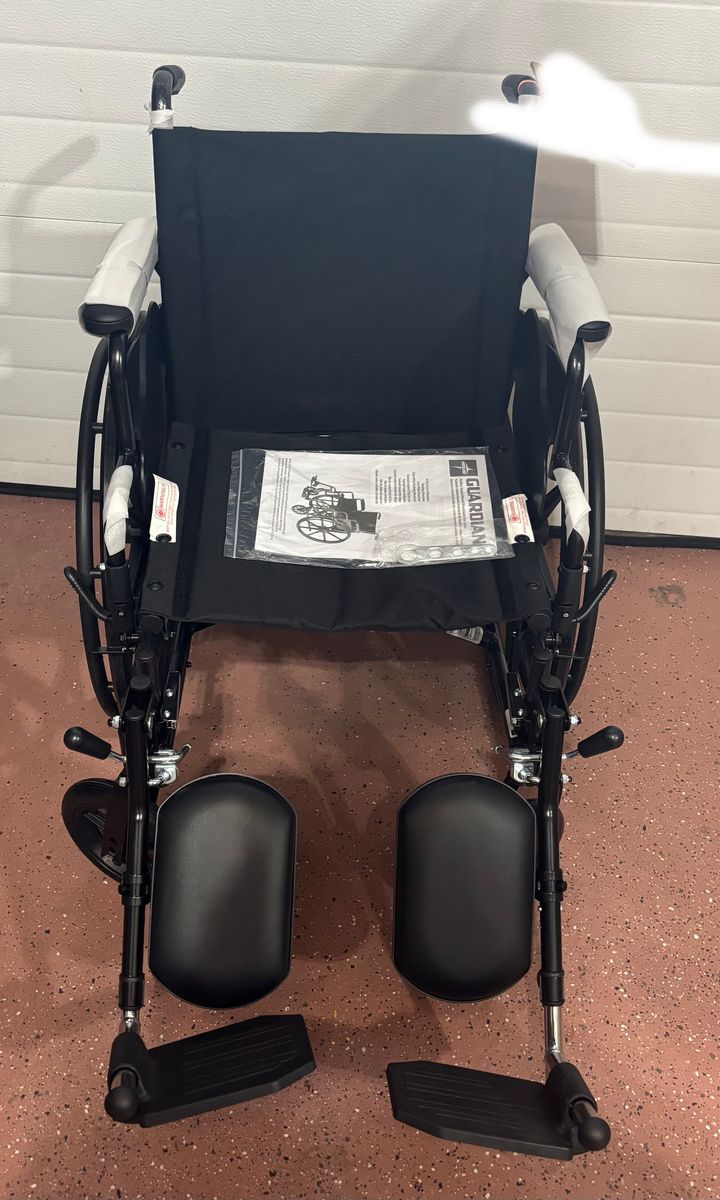 Medline Comfortable Folding Wheelchair with Swing-Back, Desk-Length Arms and Elevating Footrests