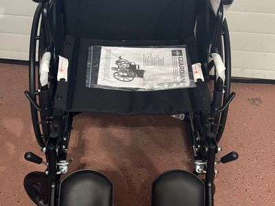 Medline Comfortable Folding Wheelchair with Swing-Back, Desk-Length Arms and Elevating Footrests