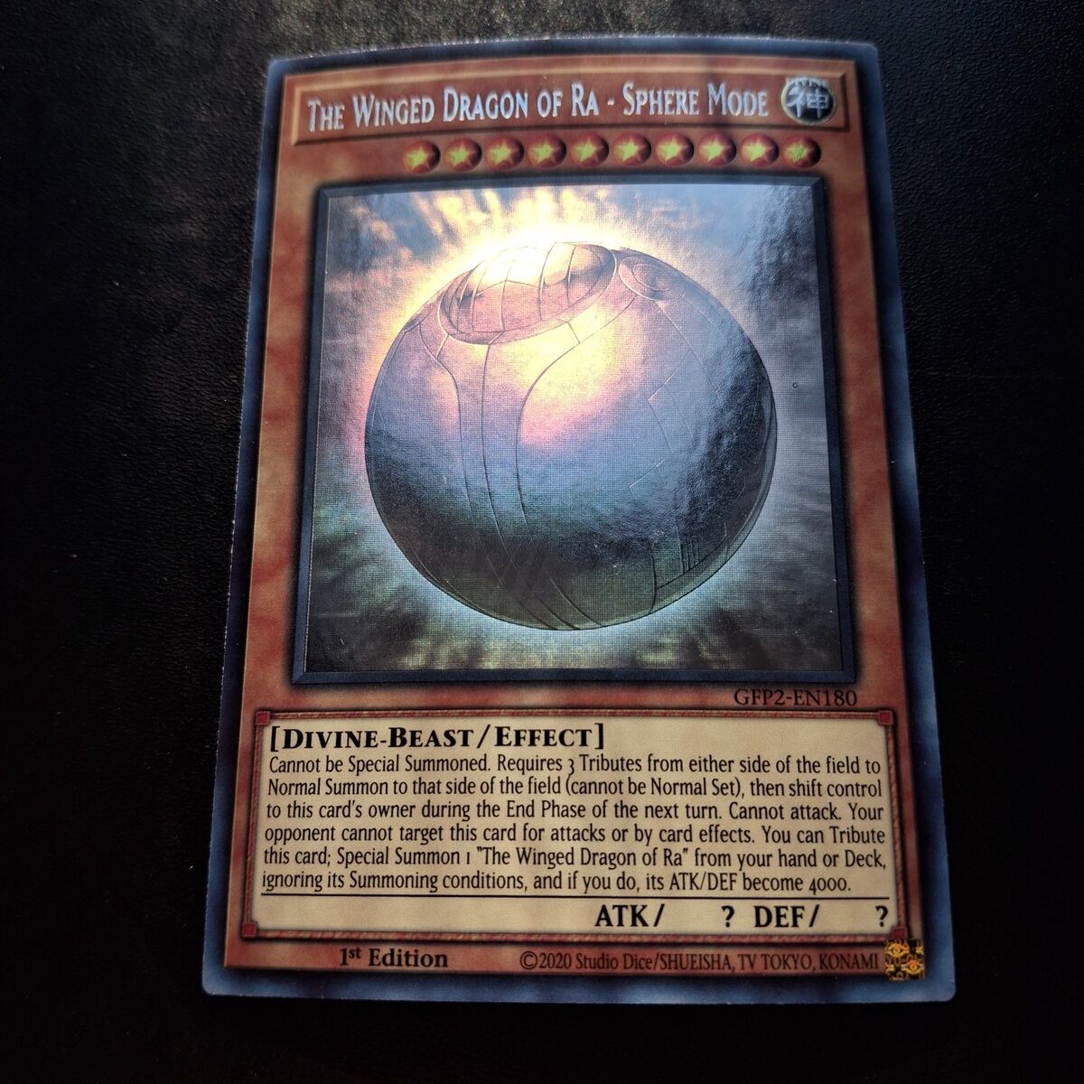 Winged dragon of RA-Sphere mode(ghost rare)yugioh