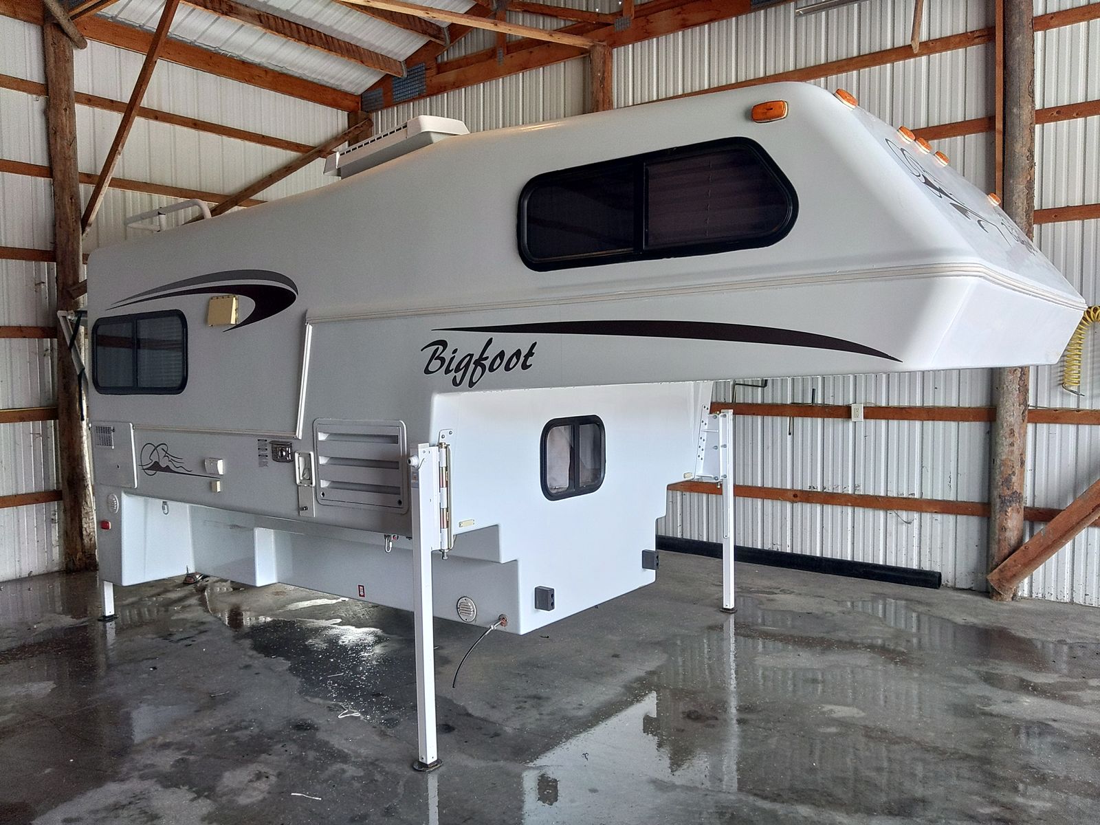 Bigfoot 4-seasons fiberglass camper new condition.