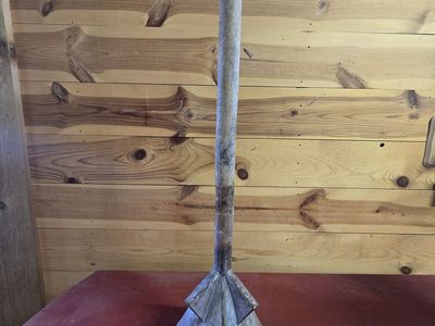antique manual laundry plunger