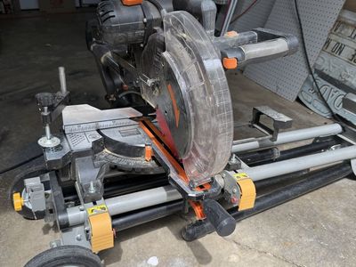 Compound miter saw with stand