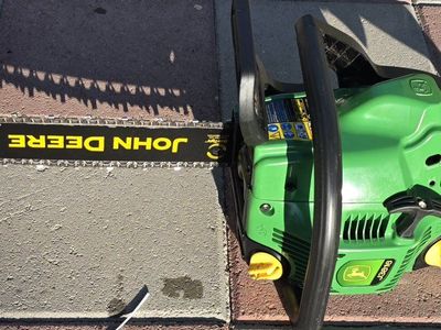 Rare John Deere J3816 chainsaw with a 16-inch bar.