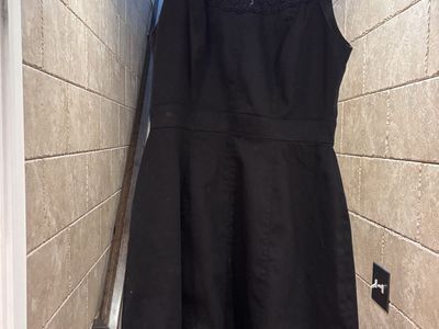 Darling size 10 black dress with eyelet detail