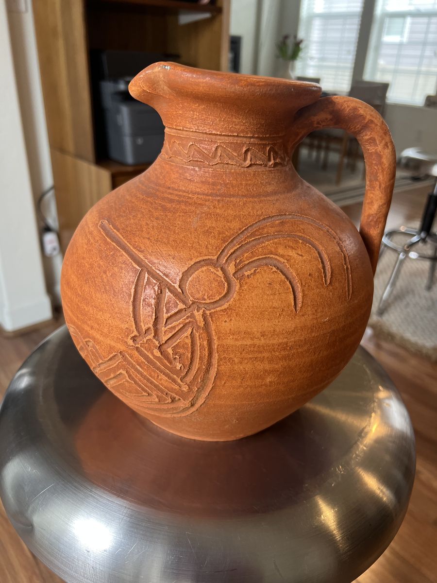 Cute Terra Cotta Jar .