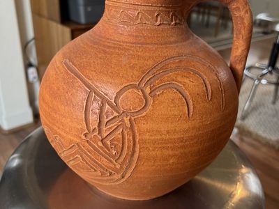 Cute Terra Cotta Jar .