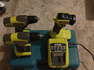 Ryobi Drill and Tool Set with Charger and Case Used