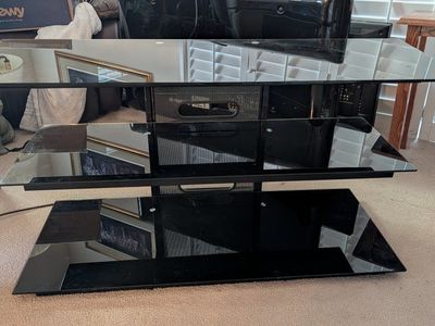 Black glass entertainment center/ tv stand