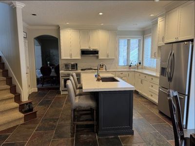 Kitchen Cabinets Set with White Quartz Countertops & Backsplash