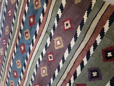 Two Mountaineer Rugs 7'10" x 11'
