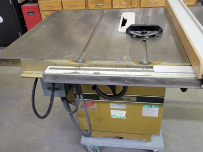5hp. Powermatic 68 Table saw with 1hp. Power feeder