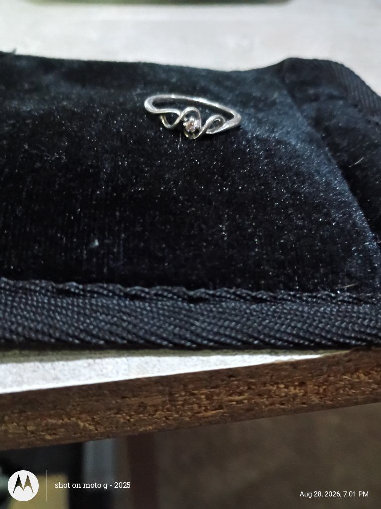 Silver Tone Swirl Band Ring with Small Center Stone comes with lifetime warranty from jewler