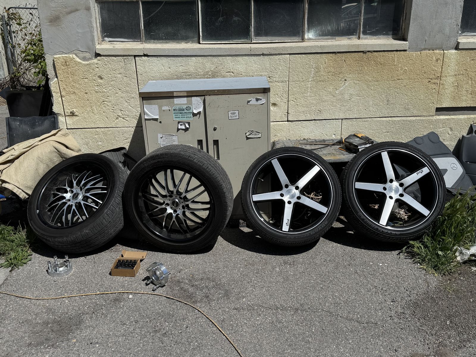 Four 20-inch aftermarket rims and tires from 2014 BMW 750iL. $600 OBO