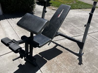 Weider 235 Weight Bench with Adjustable Incline, Preacher Curl, and Leg Developer