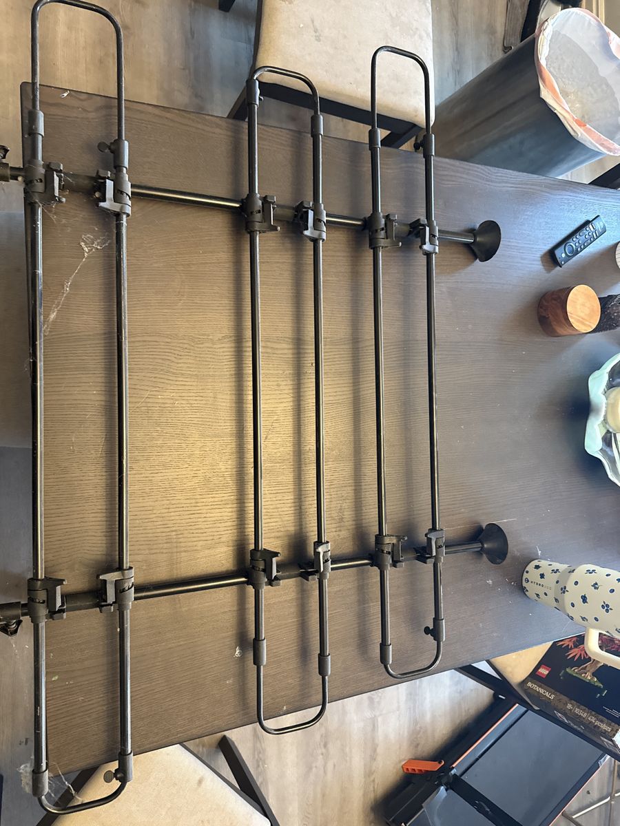 Adjustable Black Metal Wall-Mounted Display Rack - Storage & Organization Solution