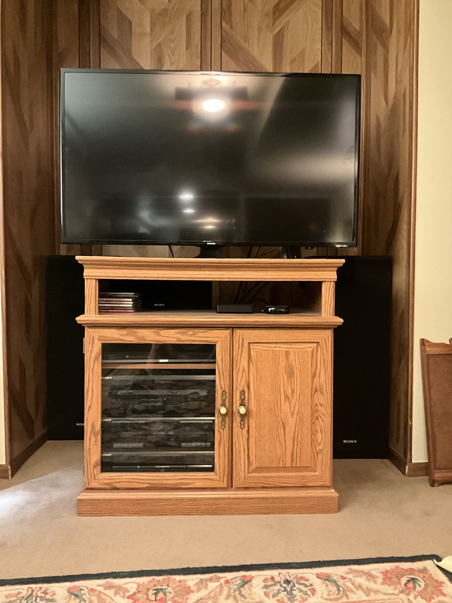 Samsung 42” TV Sony stereo system and entertainment cabinet