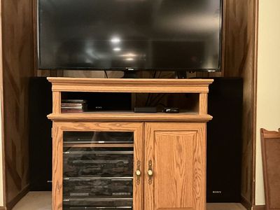 Samsung 42” TV Sony stereo system and entertainment cabinet