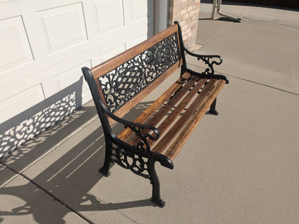 Solid oak and wrought iron patio/porch bench