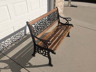 Solid oak and wrought iron patio/porch bench