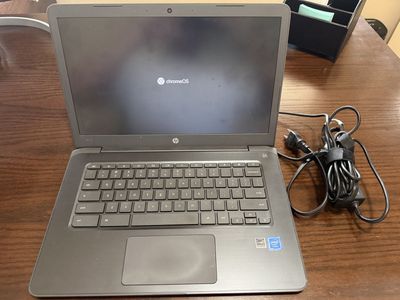 HP Chromebook Laptop and Charger