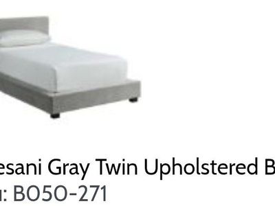 Light Gray Upholstered Twin bed great shape.