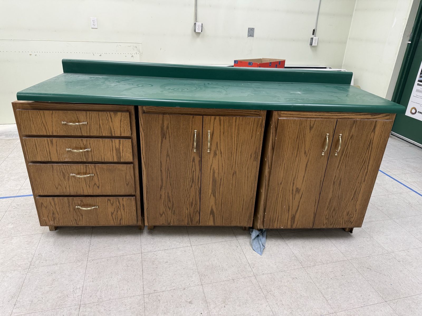 Three Cabinets And Countertop